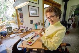 Jill Kinmont Boothe in her home art studio